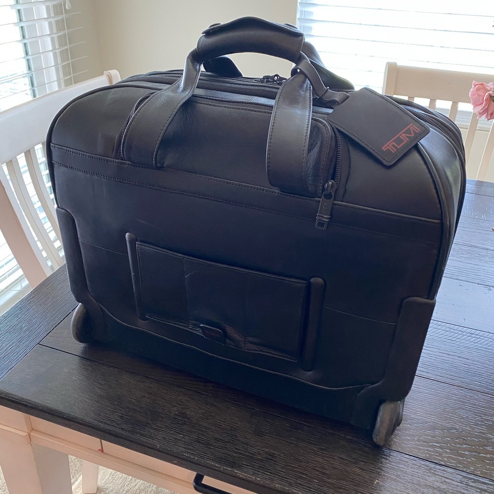 Leather Tumi rolling briefcase